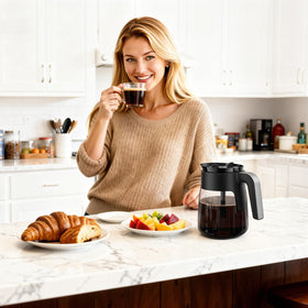 Wide-mouth lid design simplifies cleaning and refilling of the carafe.