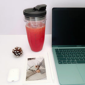 GENQORN packaging includes cups, lids, and blade for quick setup.