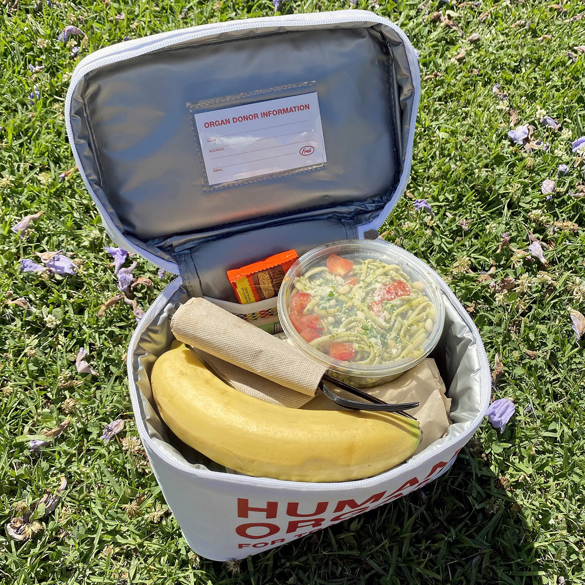 Genuine Fred EMT insulated tote interior pouch keeps utensils and napkins tidy.