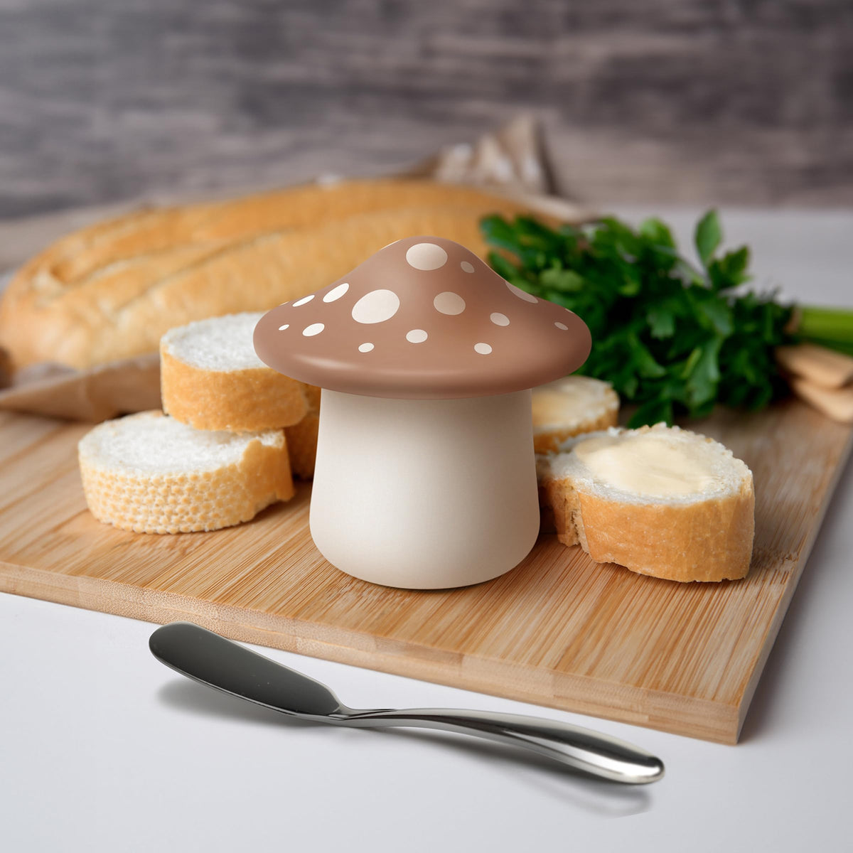 Genuine Fred Forage ceramic butter keeper is durable and countertop-ready.
