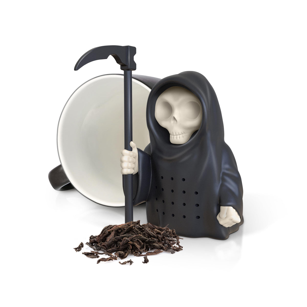 Genuine Fred Grim Steeper in use over mug with scythe resting on rim.