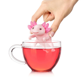 Relaxolotl hanging on mug rim for mess-free steeping by Genuine Fred.