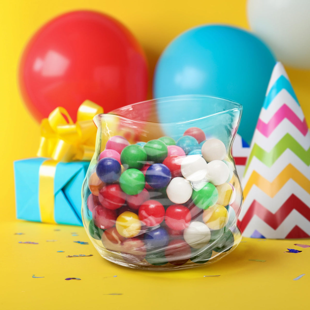 Genuine Fred UNZIPPED bowl filled with snacks on a coffee table for social moments.