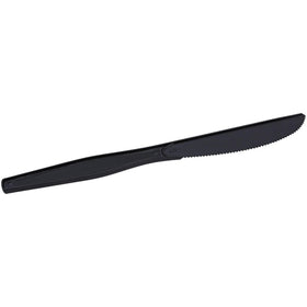 Genuine Joe black disposable knife on a banquet table for quick cleanup.