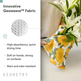 GEOMETRY Field of Gold tea towel drying dishes with a streak-free finish.
