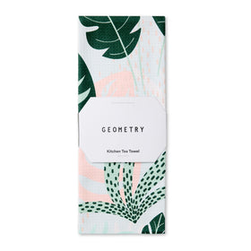 GEOMETRY Diedre kitchen tea towel folded for storage, showcasing softness and compact design.
