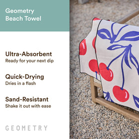 GEOMETRY Micro-Loop Beach Towel with sand-resistant weave minimizes sand sticking.