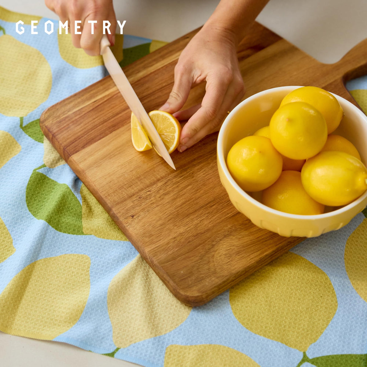 GEOMETRY Lemon Delight towel withstands repeated wash and dries fast.