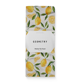GEOMETRY Lemon Delight towel folded for a neat, ready-to-use spring kitchen accent.