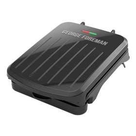 George Foreman Compact 2-Serving Grill top view enables quick, space-saving meals.