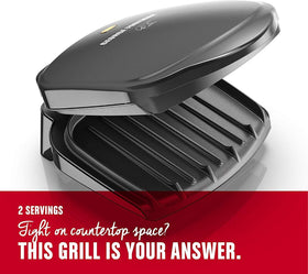 George Foreman GR10B cooking surface in action with sear marks