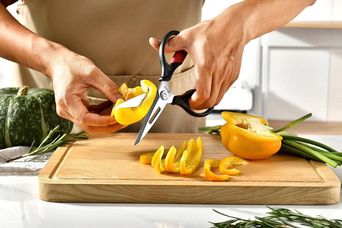 Gerior kitchen scissors performing versatile cuts in vegetables.