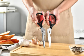 Gerior heavy-duty shears cutting herbs with precision.