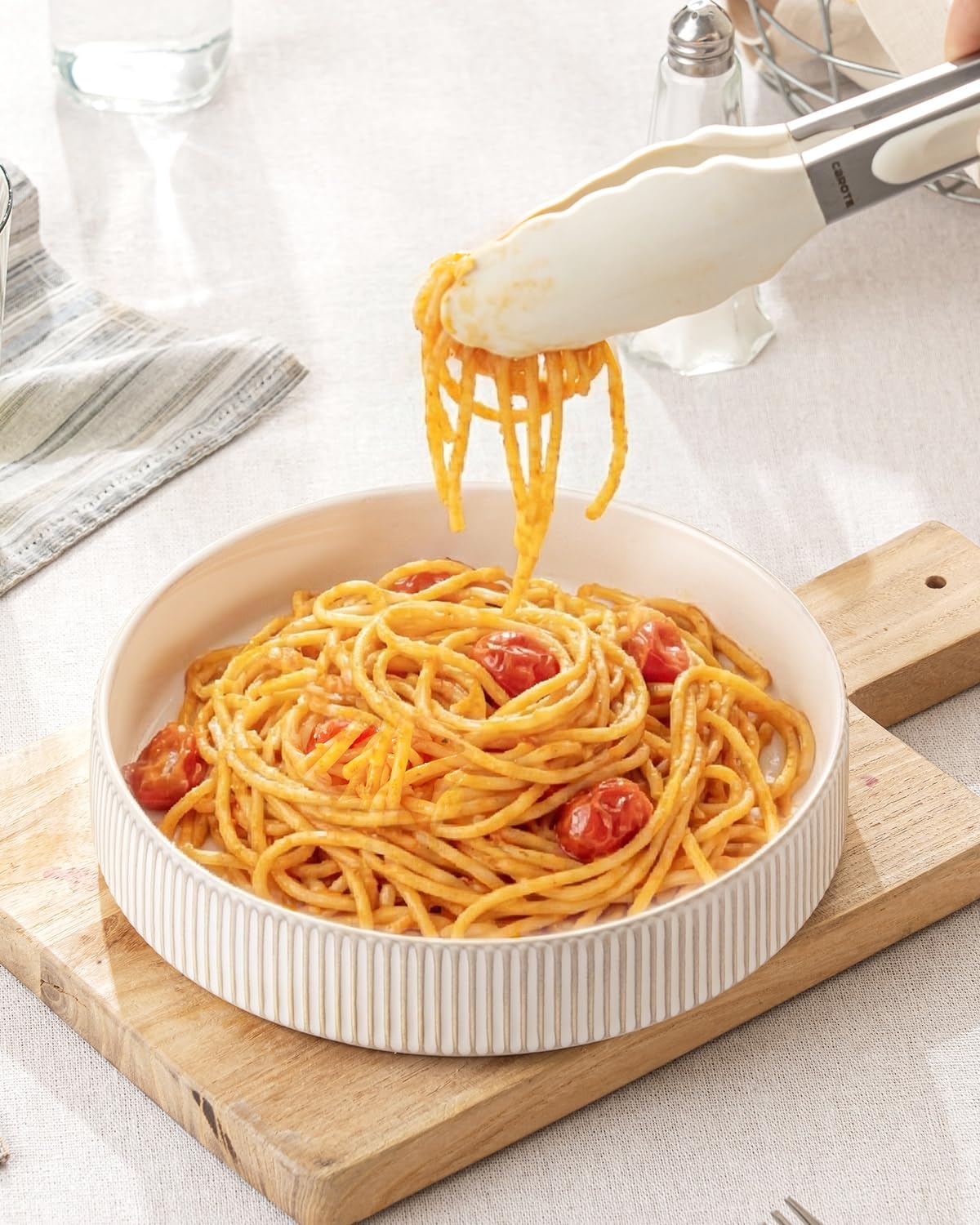 Getstar speckled white glaze enhances table setting and style.