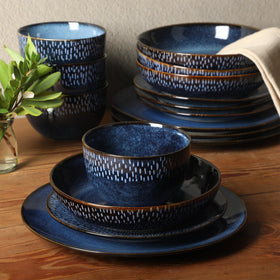 Gibson Elite Matisse table setting on table evokes a cohesive blue finish.