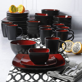 Gibson Elite Soho Lounge square dining setup with cohesive red-black styling.