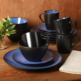 Gibson Elite Soho Round table setting shows elegant blue tones on a contemporary surface.