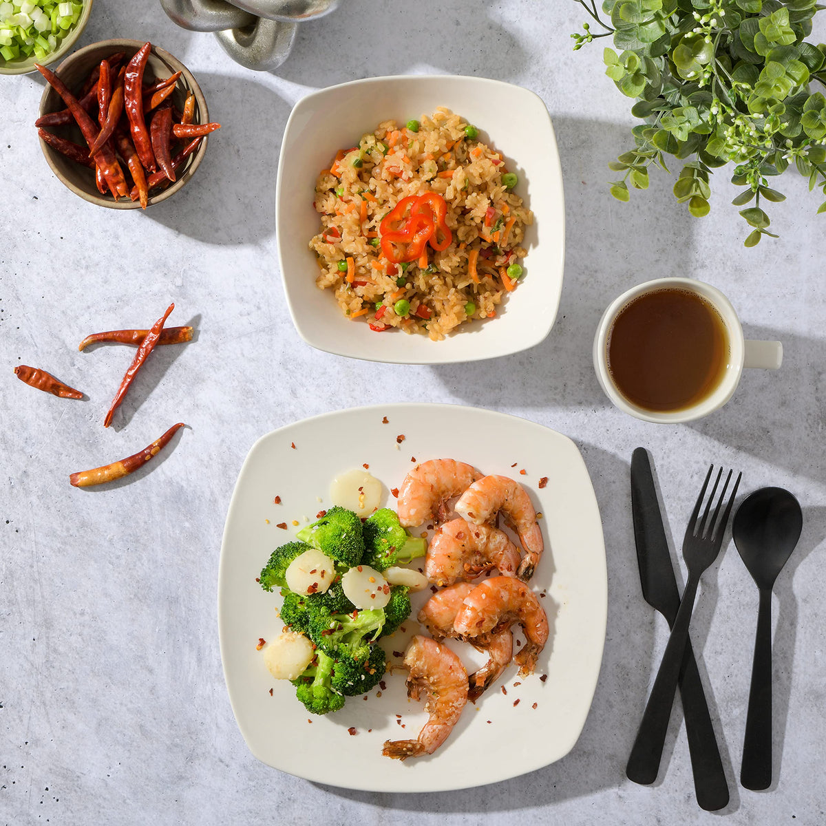 Gibson Home Amelia Court service for 4 includes plates, bowls, and mugs for family meals