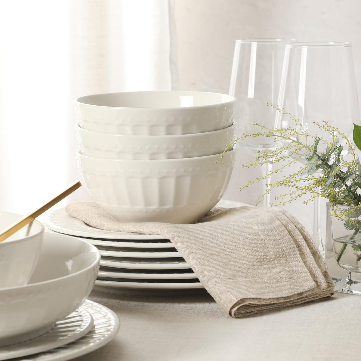 Gibson Home Melbourne white dessert plates scene for elegant dessert presentation.