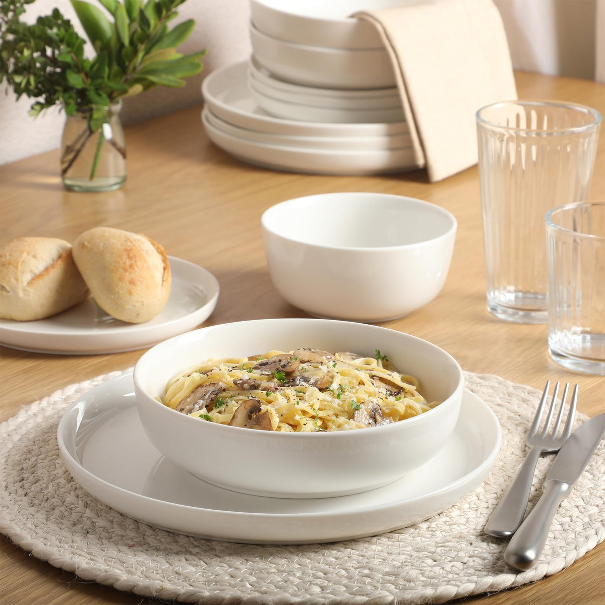 Gibson Home Oslo sculpted rim view on a white dinnerware set.