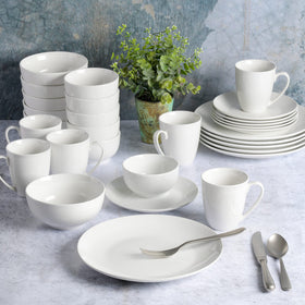 Gibson Home Oslo white plates with black rim for versatile entertaining.