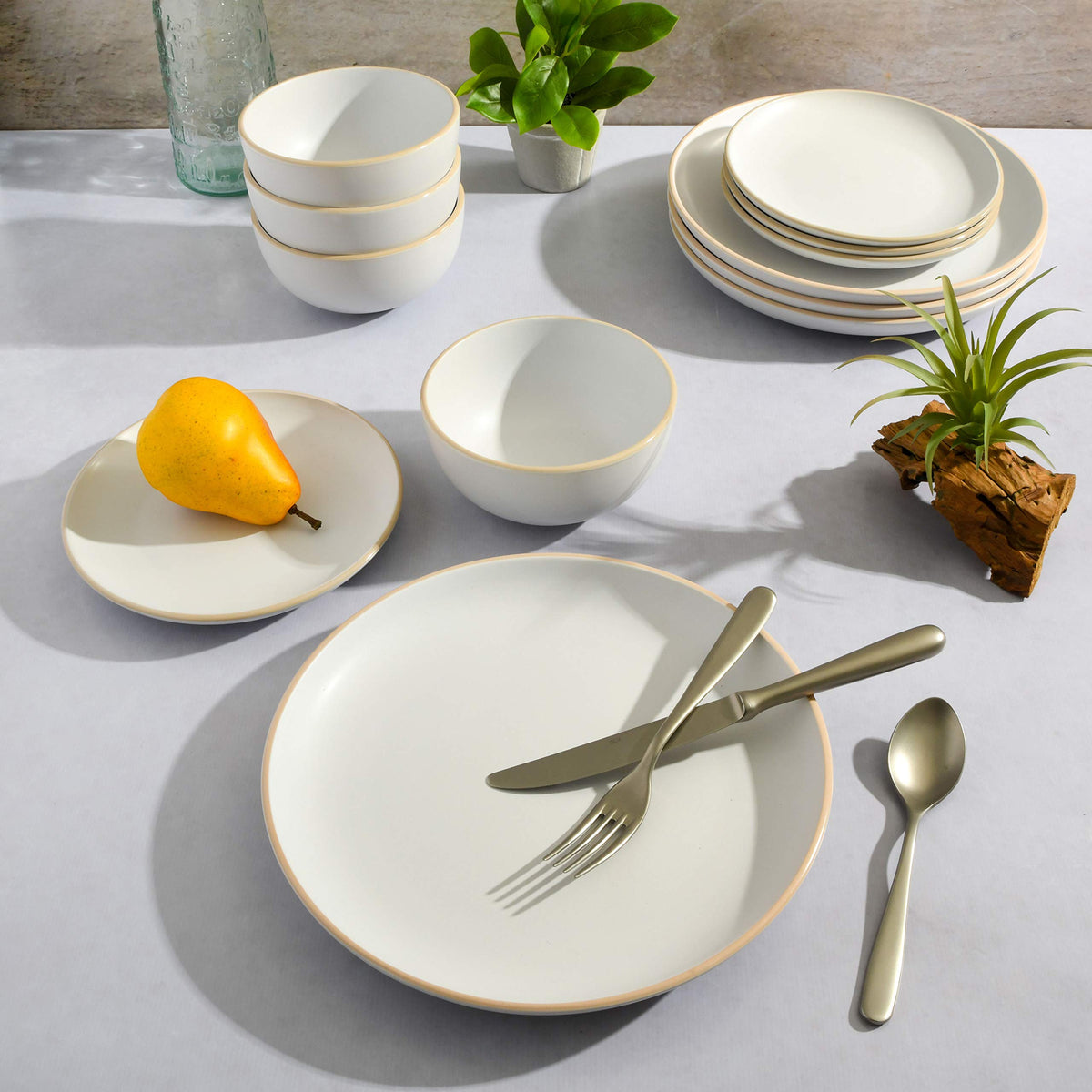 Gibson Home Rockaway serves four, ideal for family meals and casual dining.