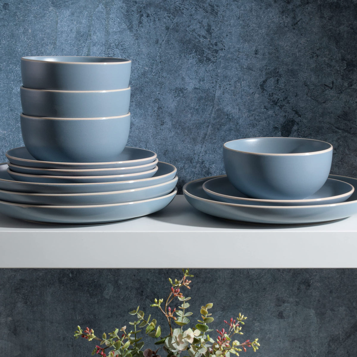 Close-up of Gibson Home Rockaway blue matte glaze showing smooth contemporary finish