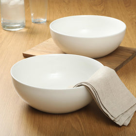 Gibson Home white glaze serving bowls complement any tablescape and dinnerware.