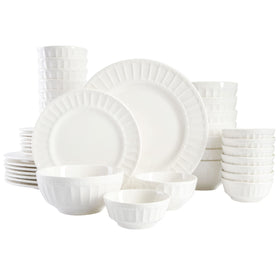 Gibson Home Zen Buffet porcelain dinnerware full set on table, ideal for gatherings.
