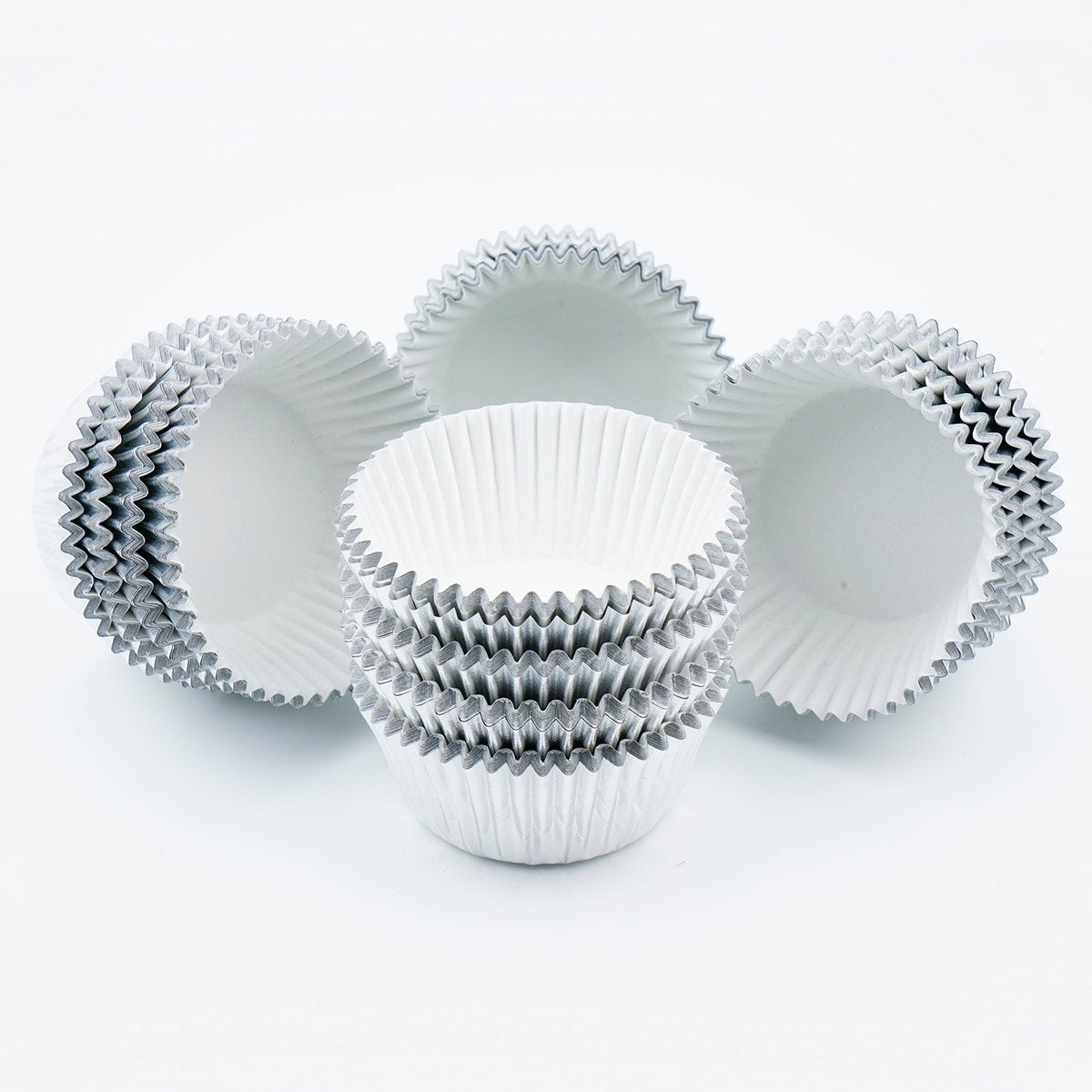 Gifbera mini silver foil cups ready for baking bite-sized cupcakes.