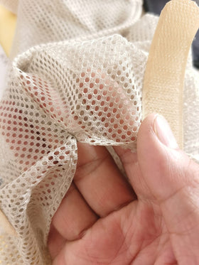 GINFH onion bag in breathable mesh to reduce moisture buildup and spoilage.