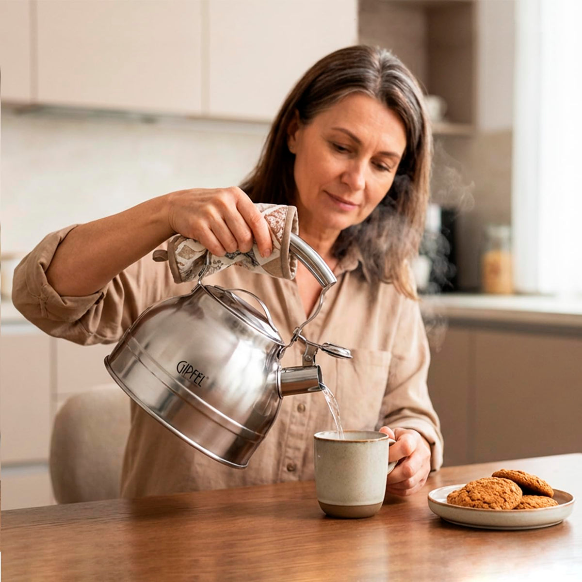 GIPFEL International induction-capable kettle with capsule bottom for fast heating.