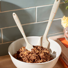 Ergonomic handle provides secure grip during mixing.