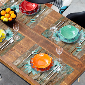 Giwawa placemats brighten kitchen decor and dining with teal floral accents.