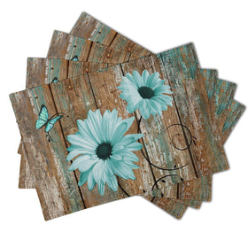 Giwawa linen placemats show teal daisies, adding color to kitchen and dining décor.