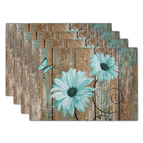 Giwawa rustic daisy placemats with teal sunflowers on vintage wood protect surfaces during meals.