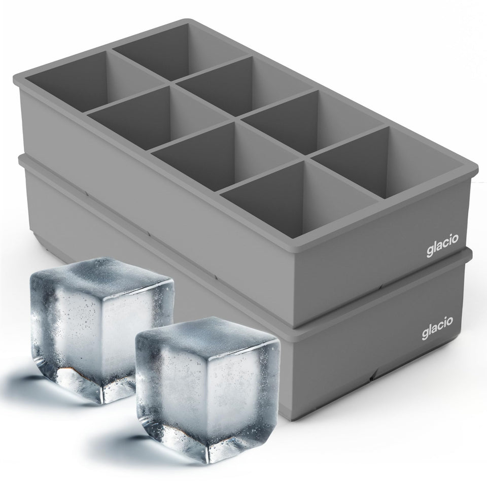 Glacio ice cube molds with eight large squares for slow-melt chilling.