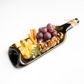 Glasiko World melted wine bottle tray with artisanal details for cheese service.