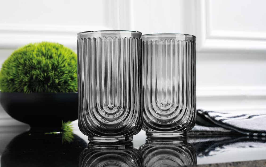 Glaver's tall highball glass shown with layered drinks for serving flair.