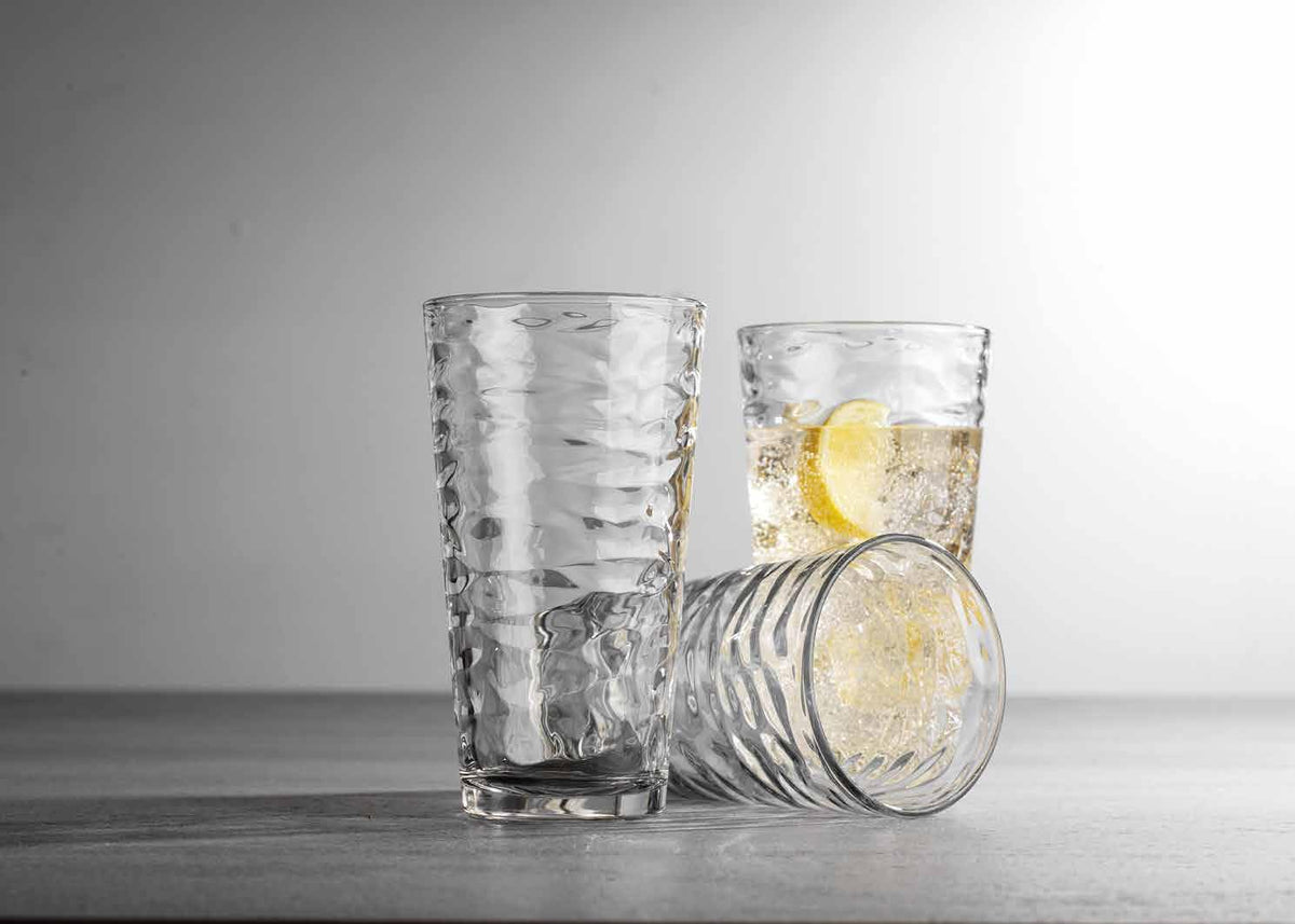 Glaver's wave ribbed glass emphasizes elegant, modern tableware for any occasion.