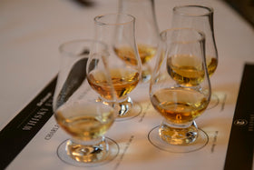 Set arrangement with six GLENCAIRN glasses, perfect gift for enthusiasts.