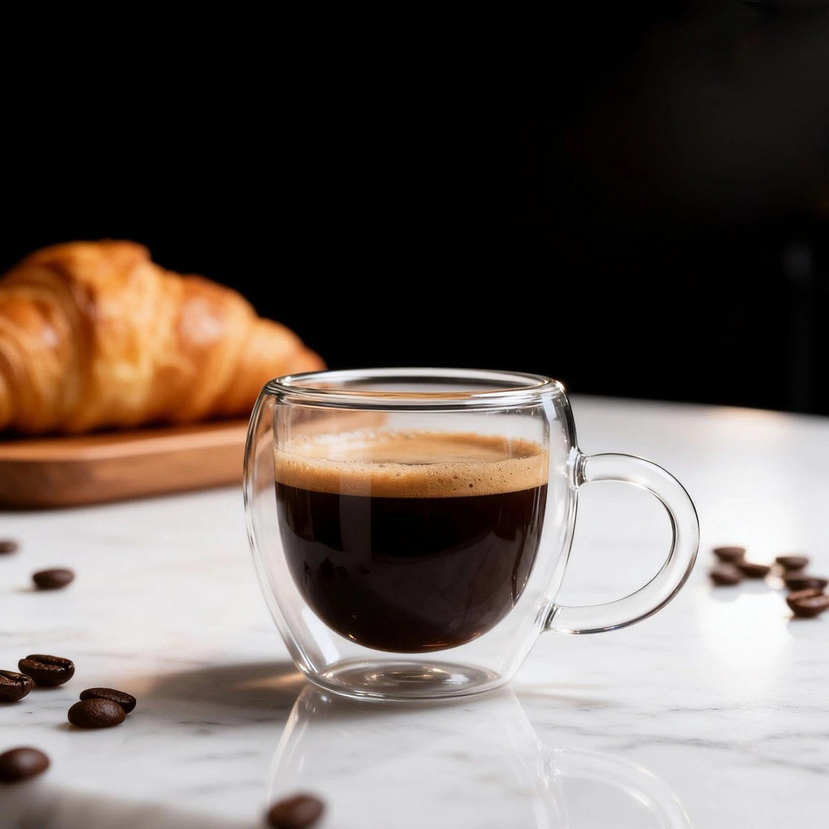 Glenkach double-wall espresso glass highlighting condensation-free hands and clarity.