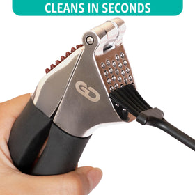 Global Digitronix heavy-duty garlic press with durable design.