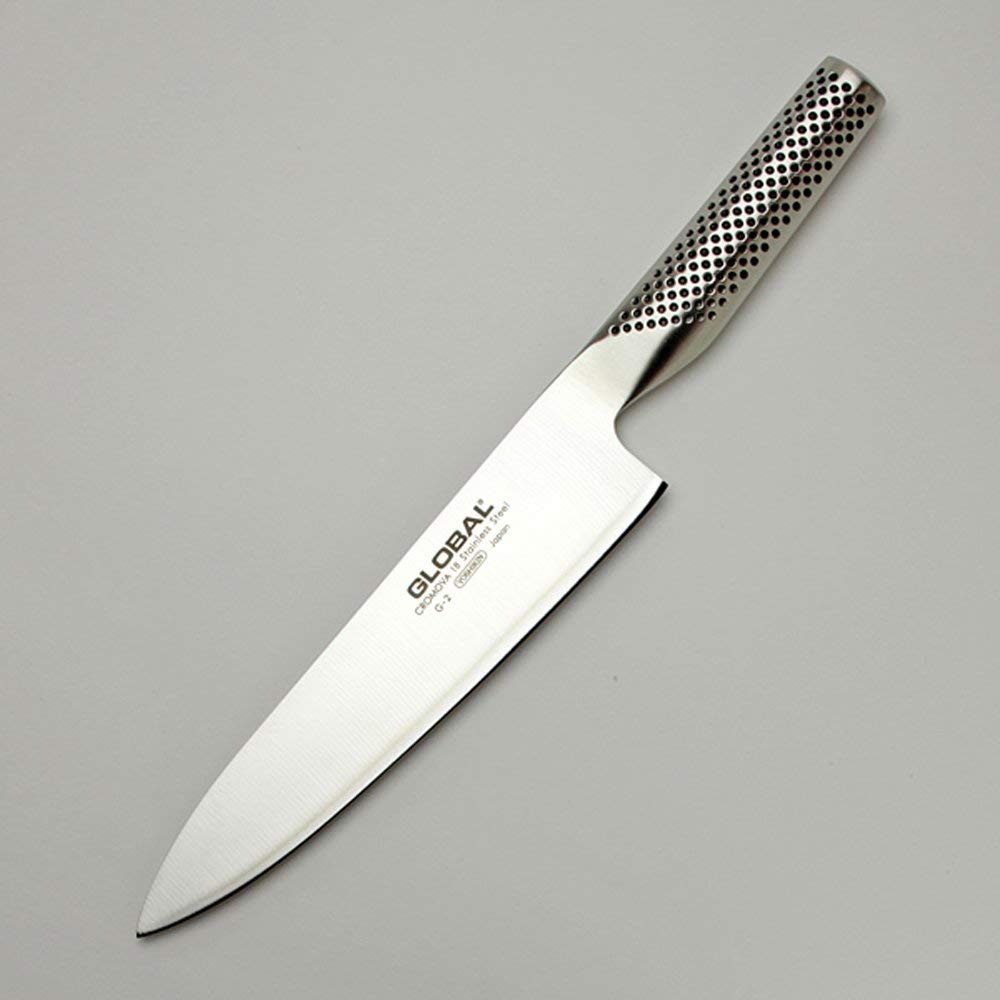 Global Knives dimpled stainless-steel handle provides a secure, comfortable grip.