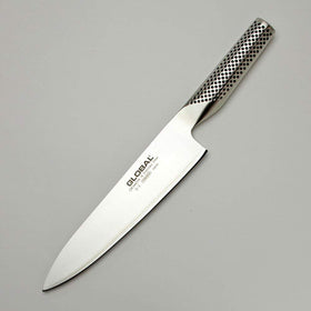 Global Knives dimpled stainless-steel handle provides a secure, comfortable grip.