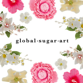 Global Sugar Art 6x6 cake dummy in use for decorating session.