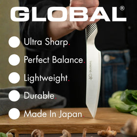 Global 3.5-inch paring knife peeling apple to demonstrate delicate tasks