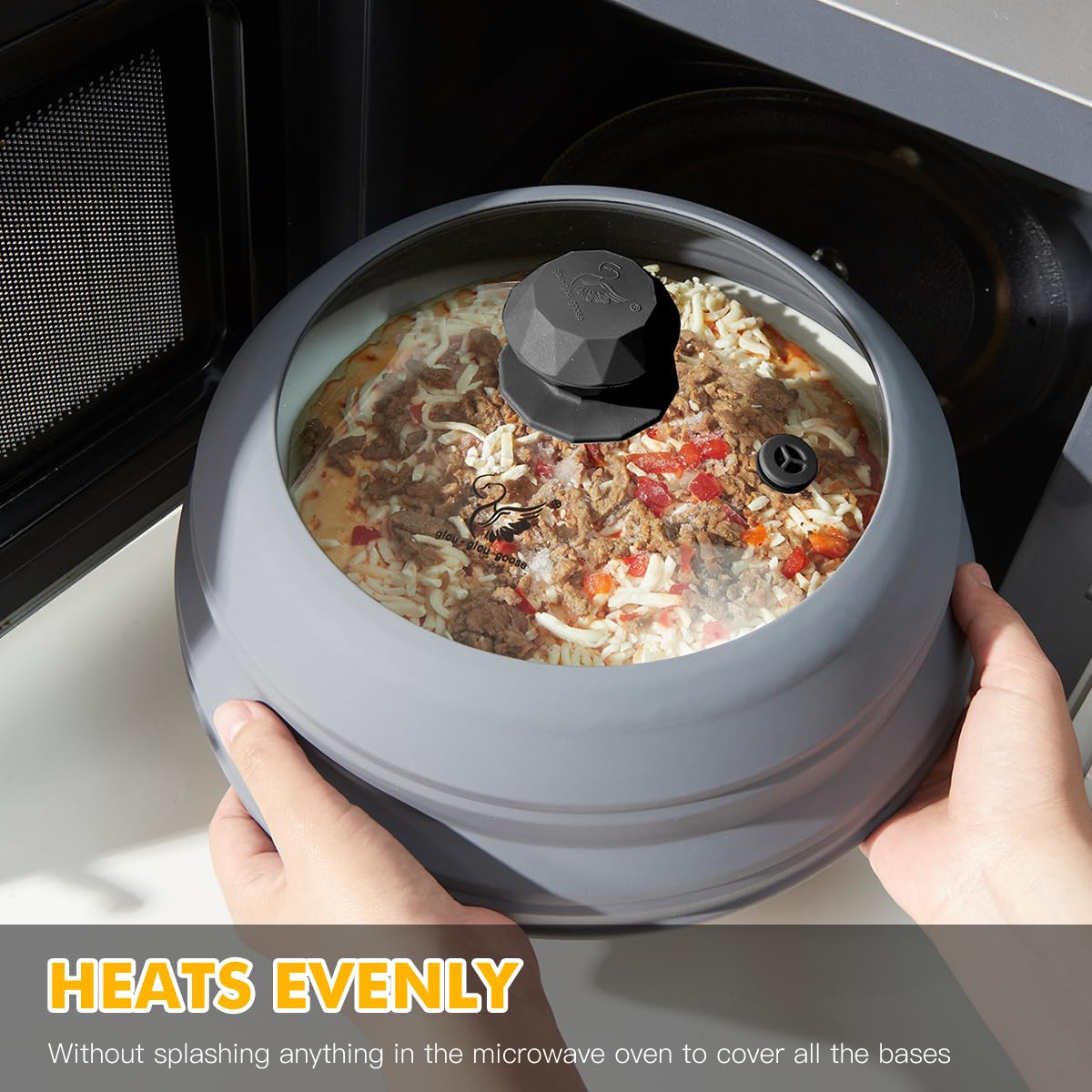 Vented lid releasing steam to control moisture during reheating