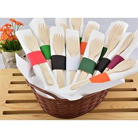 Elegant black napkin bands enhance upscale dining aesthetics.