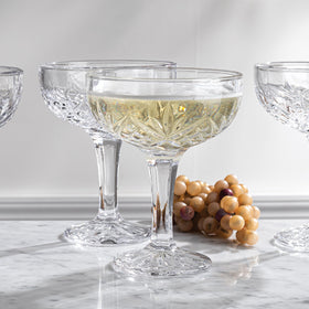 Godinger 6oz champagne glasses offering balanced pours and stylish confidence.